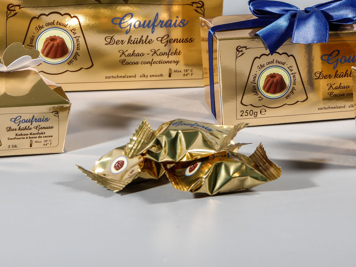 Goufrais in Goldtüte und Geschenkschachtel – Verpackung, die die Ware schützt