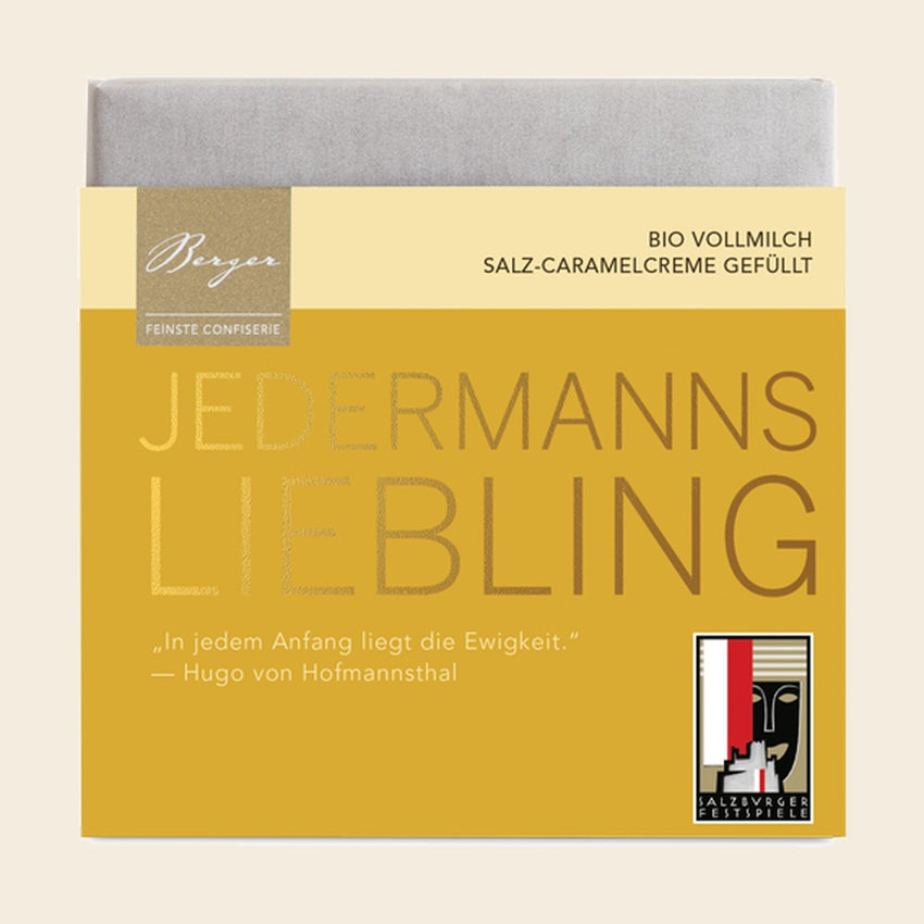 Bio Vollmilch Salz-Caramelcreme gefüllt 100g „Jedermanns Liebling“ – Tafelschokolade von Confiserie Berger, 100 g, freigestellt vor cremefarbenem Hintergrund