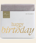 Thementafel Bio Vollmilch "Happy Birthday" – Tafelschokolade von Confiserie Berger, 40 g, freigestellt vor cremefarbenem Hintergrund