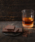 Bio Edelbitter Rum gefüllt – Schokolade von Confiserie Berger, 100 g, angerichtet