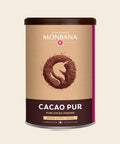 Monbana 100 % Kakao Trinkschokolade – 150 g Dose, freigestellt vor cremefarbenem Hintergrund