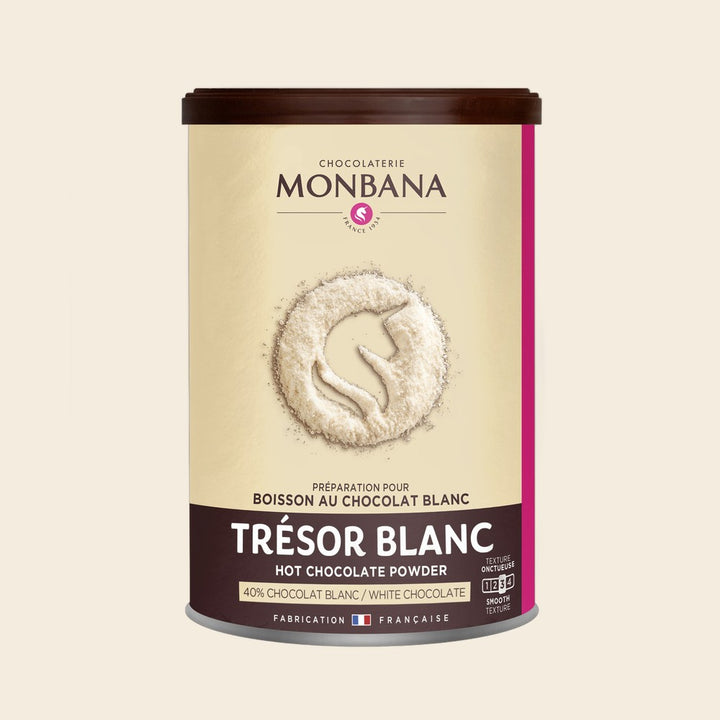 Monbana Trésor White Trinkschokolade – 200 g Dose, freigestellt vor cremefarbenem Hintergrund