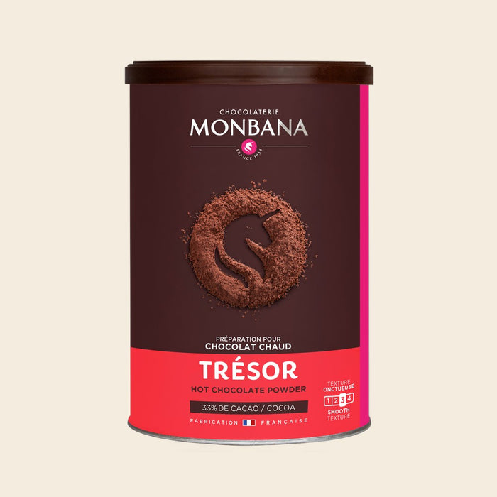 Monbana Trésor Trinkschokolade – 250 g Dose, freigestellt vor cremefarbenem Hintergrund