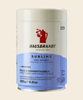 Hausbrandt Sublime Moka Kaffee – Espresso, 250 g, freigestellt vor cremefarbenem Hintergrund