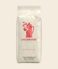 Hausbrandt Qualita Rossa Espresso Kaffee – Espresso, 1000 g, freigestellt vor cremefarbenem Hintergrund