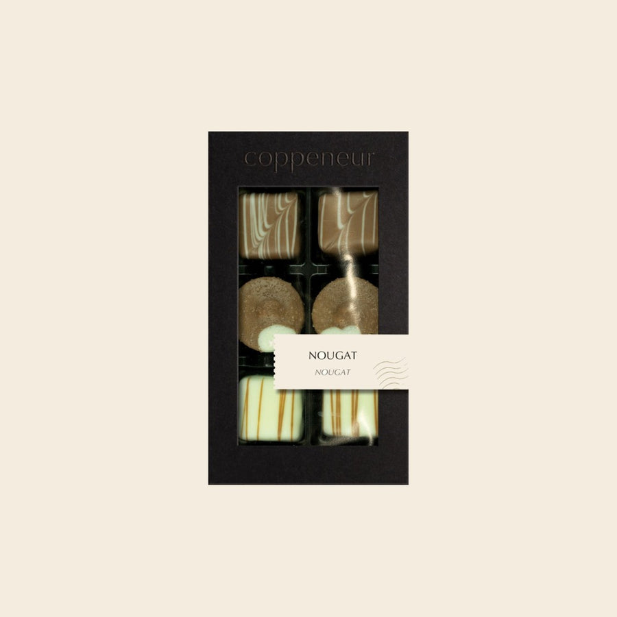 6er Sélection Nougat von Coppeneur – Pralinenschachtel auf cremefarbenem Hintergrund