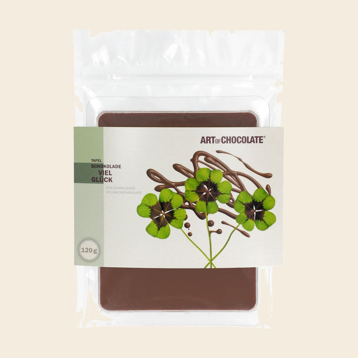 Viel Glück – Tafelschokolade von Art of Chocolate, 120 g, freigestellt vor cremefarbenem Hintergrund