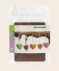 Alles Gute – Tafelschokolade von Art of Chocolate, 120 g, freigestellt vor cremefarbenem Hintergrund