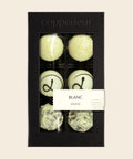 6er Sélection Blanc von Coppeneur – Pralinenschachtel freigestellt auf cremefarbenem Hintergrund